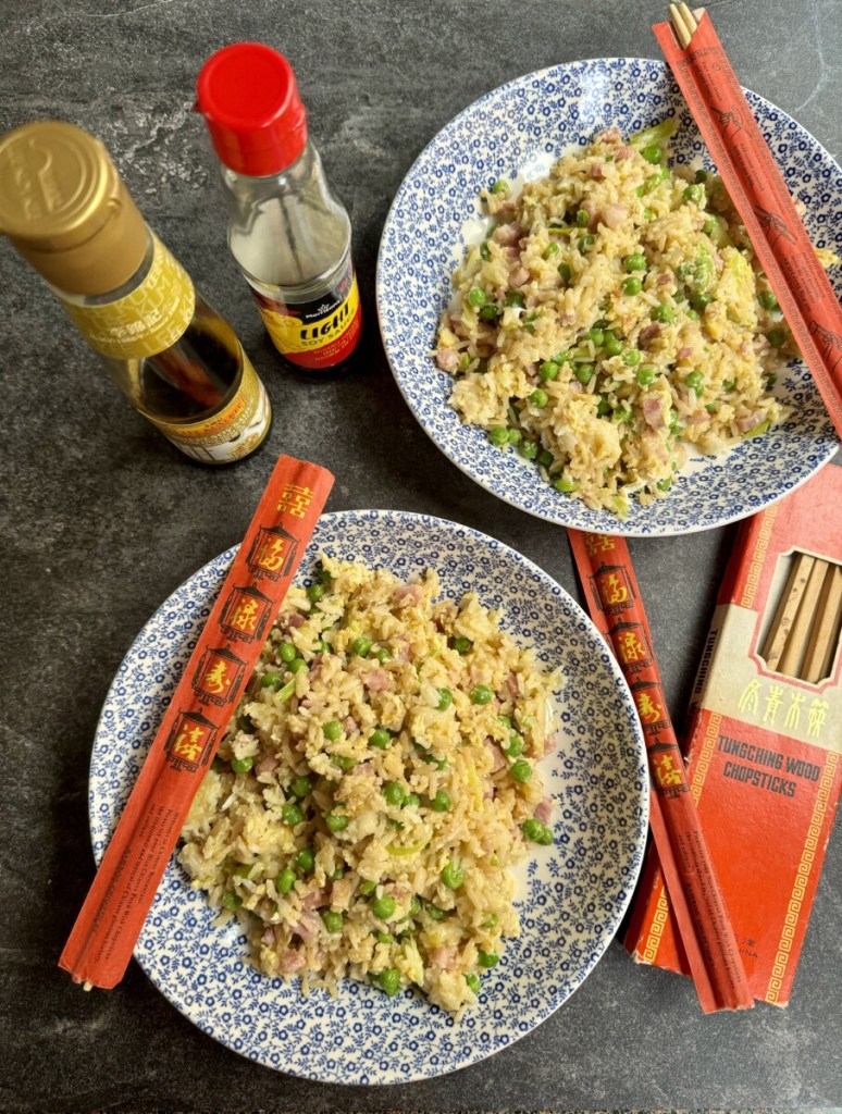 Mainly given that she had access to Western ingredients that we used to buy from the NAAFI, and that there was always leftover cooked rice.
The smell as it's cooking and the taste takes me right back to my childhood in Hong Kong, and it's such an easy dish to cook too.
It's a very versatile dish, using cold leftover rice, bacon, spring onions, frozen peas and eggs.
