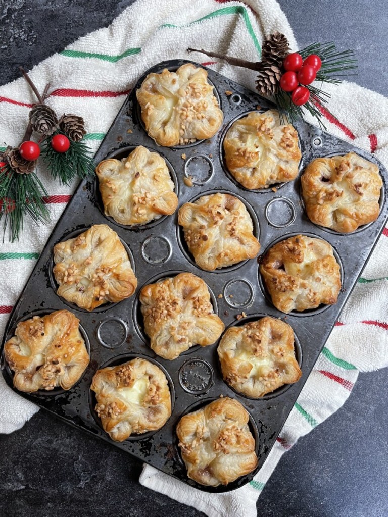 Once made, these Mini Brie & Cranberry Puff Pastry Parcels can be eaten warm, or they can be reheated very easily just before serving.
You can also freeze them once they are baked; just reheat once they have fully defrosted in a warm oven for about 5 to 10 minutes.